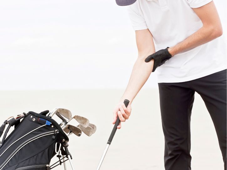 Golfer with golfers elbow